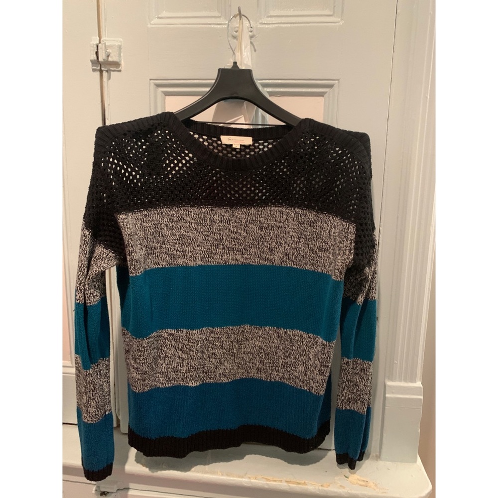 Sweater knit top with knit mesh along shoulders